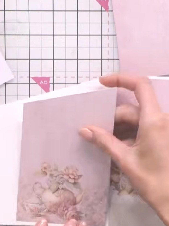 Step 8: Fussy cut the embellishments from the embellishment pack, including the lady figure and decorative floral elem