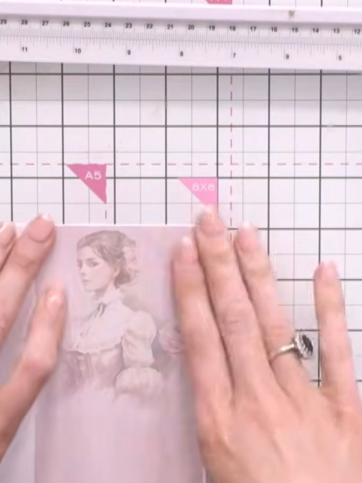 Step 9: Position and glue the two vellum envelopes onto the card front, arranging them to create visual interest.