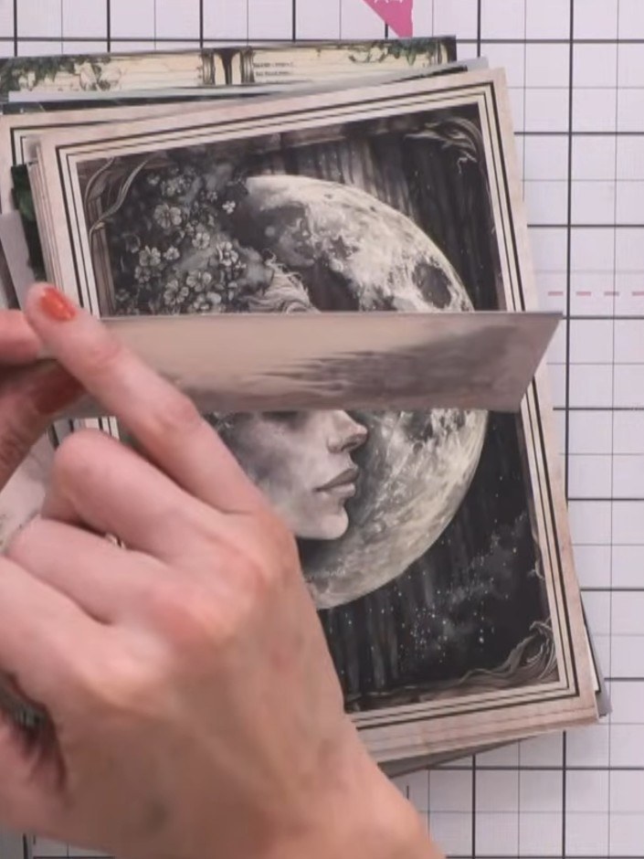 Step 1: Take a piece of patterned paper from the Misty Hollow collection and fold it in half to create your card base.