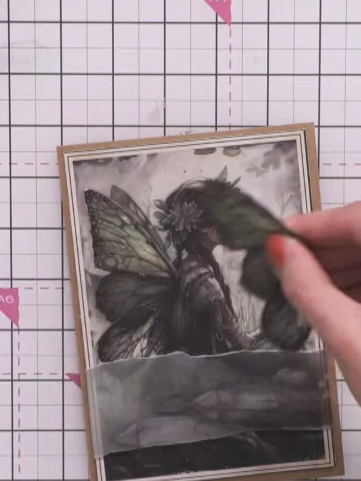 Step 10: Warm the fairy image slightly with your hand and gently curve the wings to add dimension and movement to the d