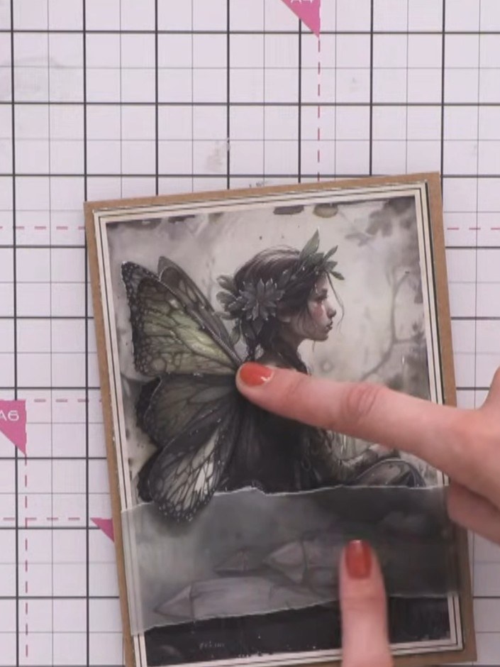Step 11: Attach the fairy image to the card front using 3D foam pads, positioning it so the wings sit proud above the t