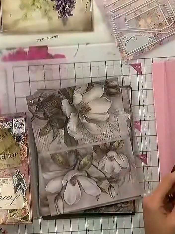 Step 6: Insert sentiment cards or small decorative items into the pockets of your mini album pages. Slide the cards ge