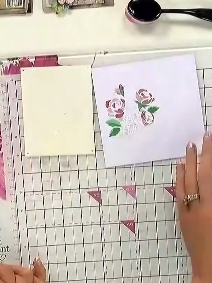 Step 1: Create a stencilled background using your layering stencils and coloured inks. Position the stencil on your ca