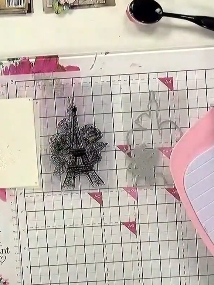 Step 3: Close the pink embossing folder carefully over your stamped design, ensuring the image is centred within the f