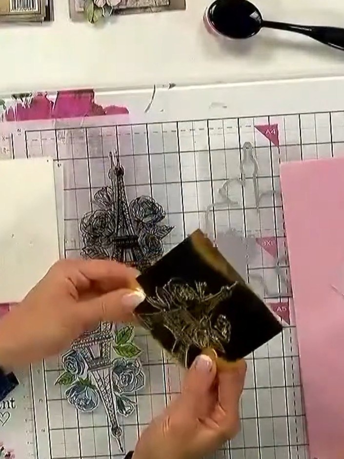 Step 5: Run the sandwich through your die-cutting machine using the hand crank to emboss the design onto your card.