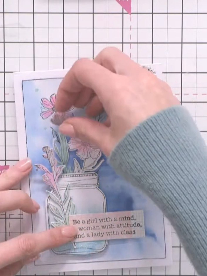 Step 10: Mount the sentiment topper onto the card front using foam pads to create dimension. Position it centrally over