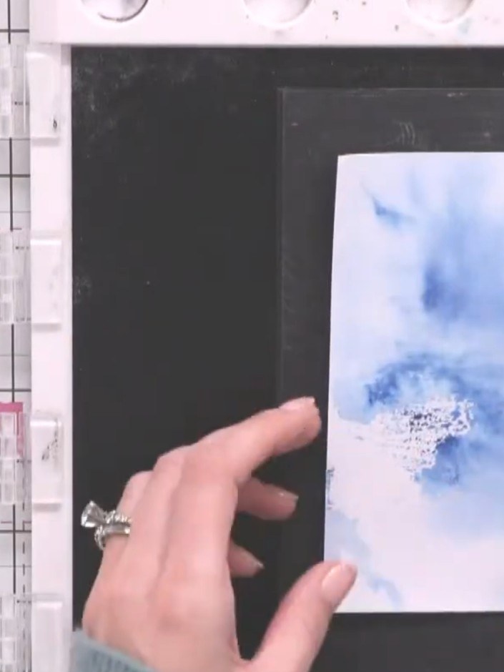 Step 1: Trim the inky watercolour card piece to remove the lumpy, bumpy edges using a guillotine or craft knife and ru