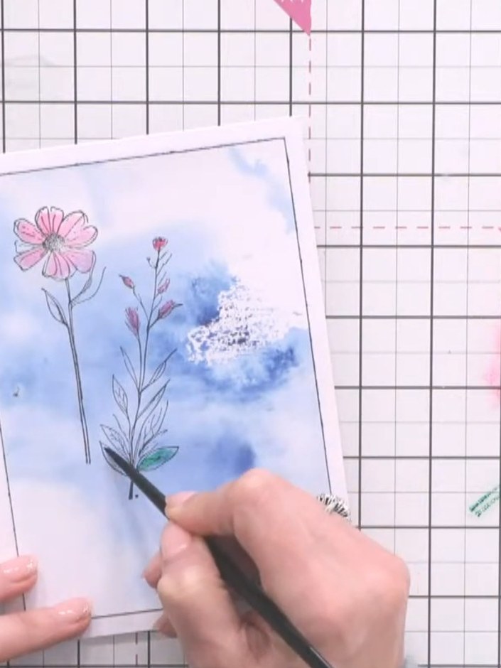 Step 5: Stamp the flower images from the Berrylicious stamp set onto the dried watercolour wash background. Position t