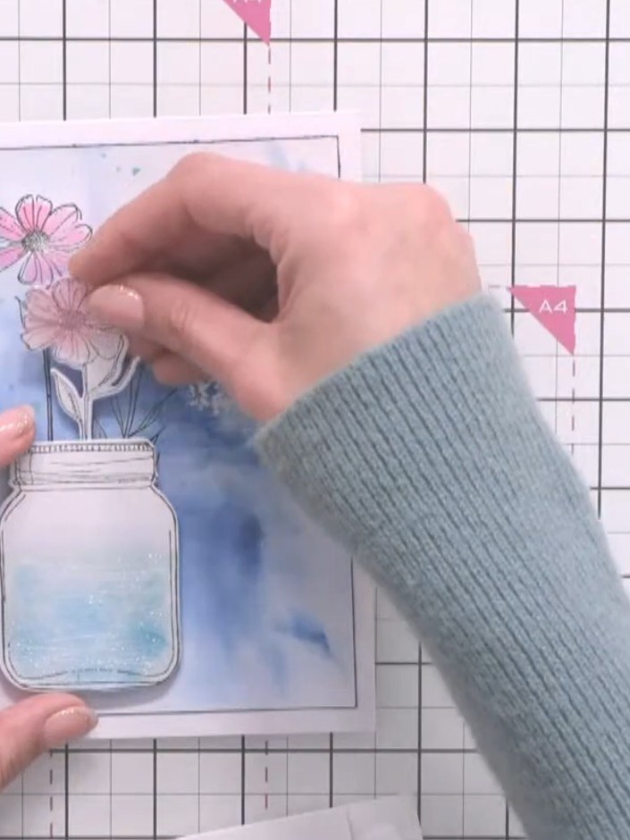 Step 7: Add foam pads to the back of the stamped flower elements to create dimension on your card.