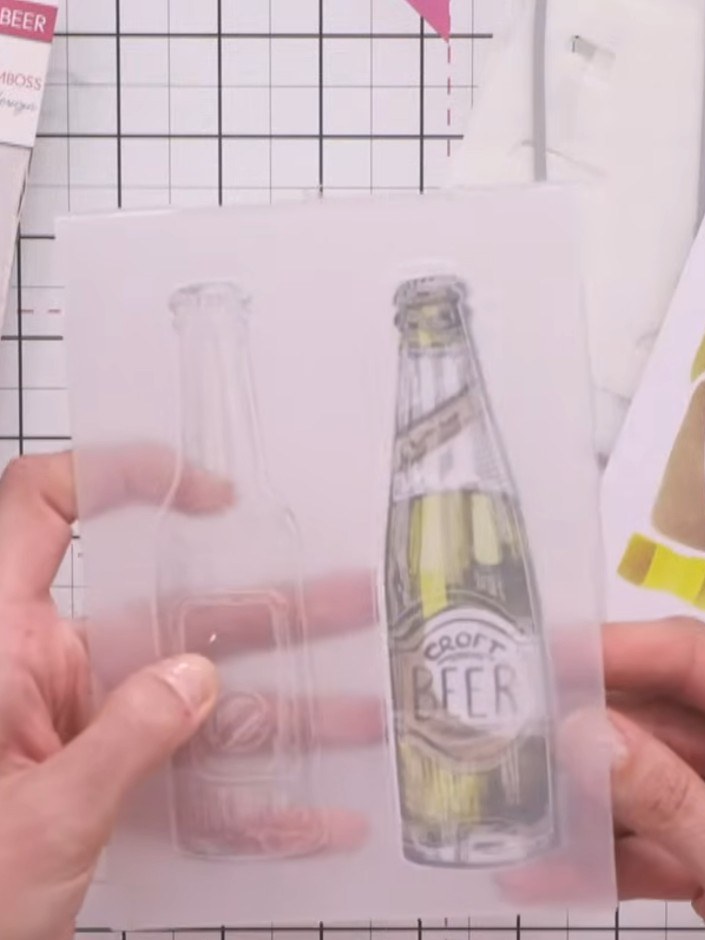 Step 6: Layer the embossed bottle piece onto your card base. Use foam pads to add dimension if desired, positioning th