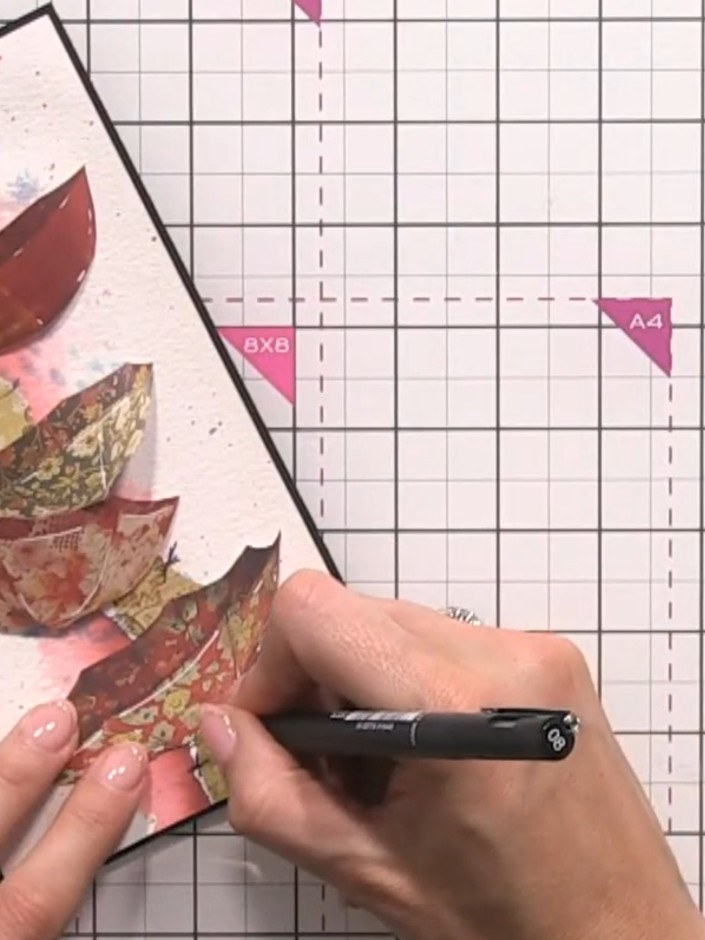 Step 11: Using a black pen, draw in the umbrella handles and tops freehand on each of the torn paper umbrellas.