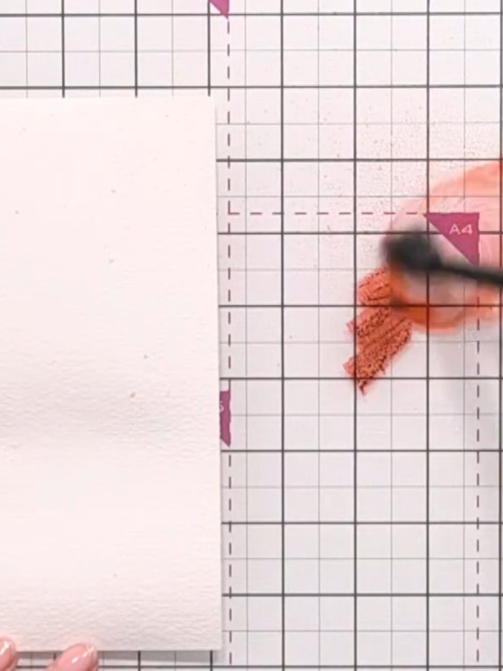 Step 3: Tap the Redwood ink pad onto the wet area, allowing the colour to drag down into the water. Build up the colou
