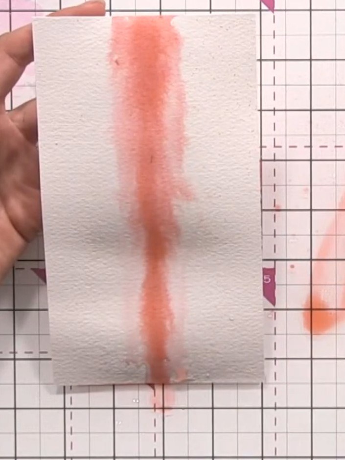 Step 4: Use a tissue or baby wipe to gently dab and mop up excess water from the watercolour ink area. This helps cont