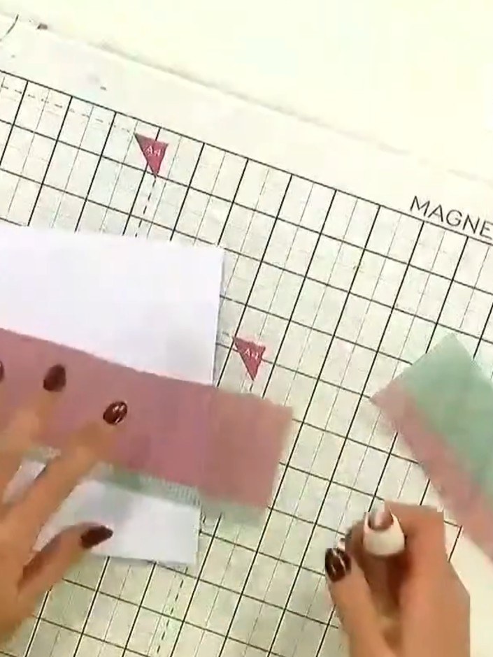 Step 3: Apply double-sided tape or adhesive to the back of the vellum panel. Position the tape along the edges to secu
