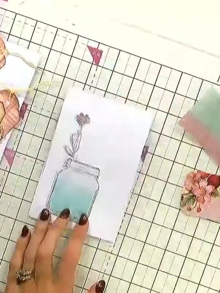 Step 2: Add faux water inside the jar using watercolour paint in soft blue tones. Paint the lower portion of the jar t