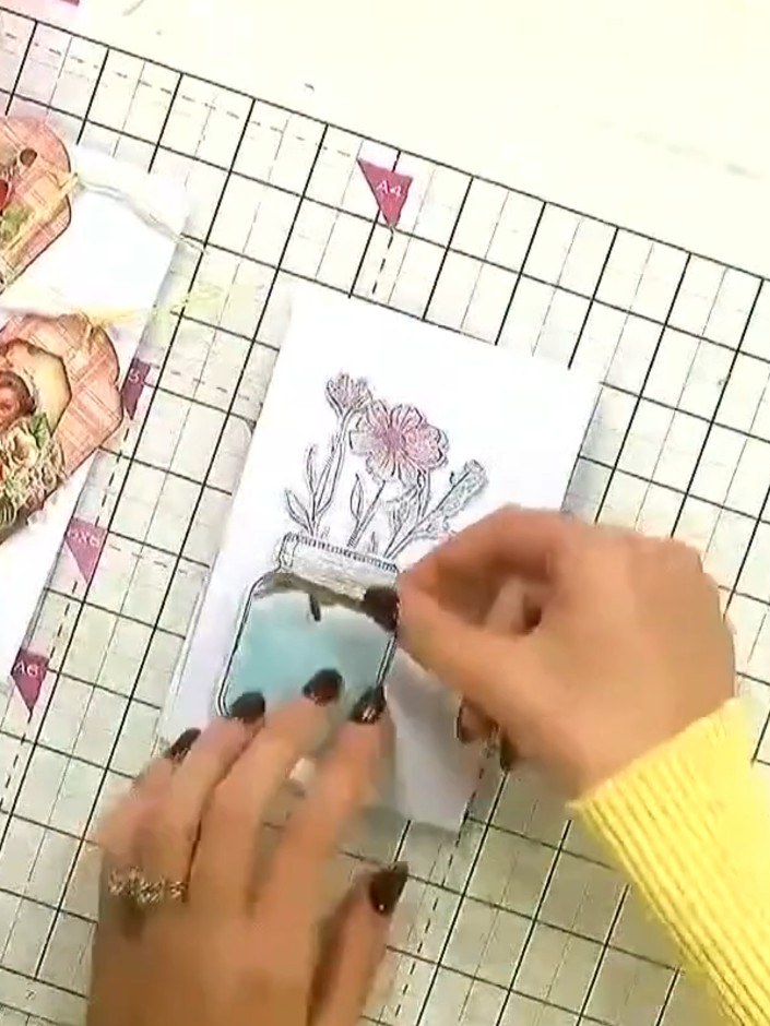 Step 3: Add sparkle or glitter to the watercoloured jar to create the effect of water. Apply the glitter whilst the wa