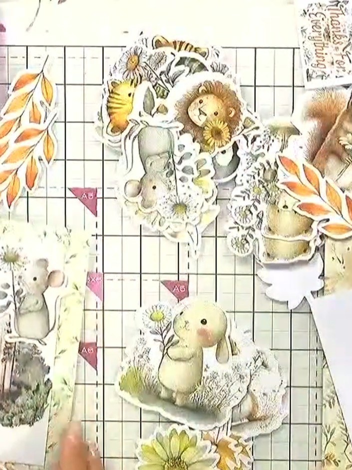 Step 4: Select your chosen animal die-cut and position it on the card front. Press the animal firmly onto the card to 
