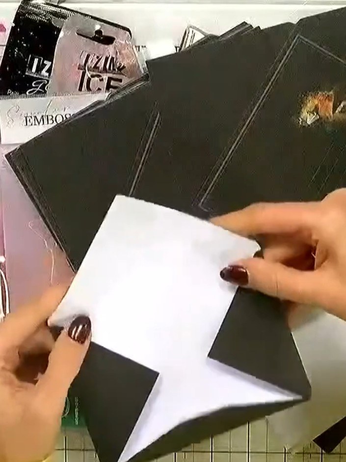 Step 5: Use the embossed dark grey card as a base for your project, or layer it onto another card blank for added dime