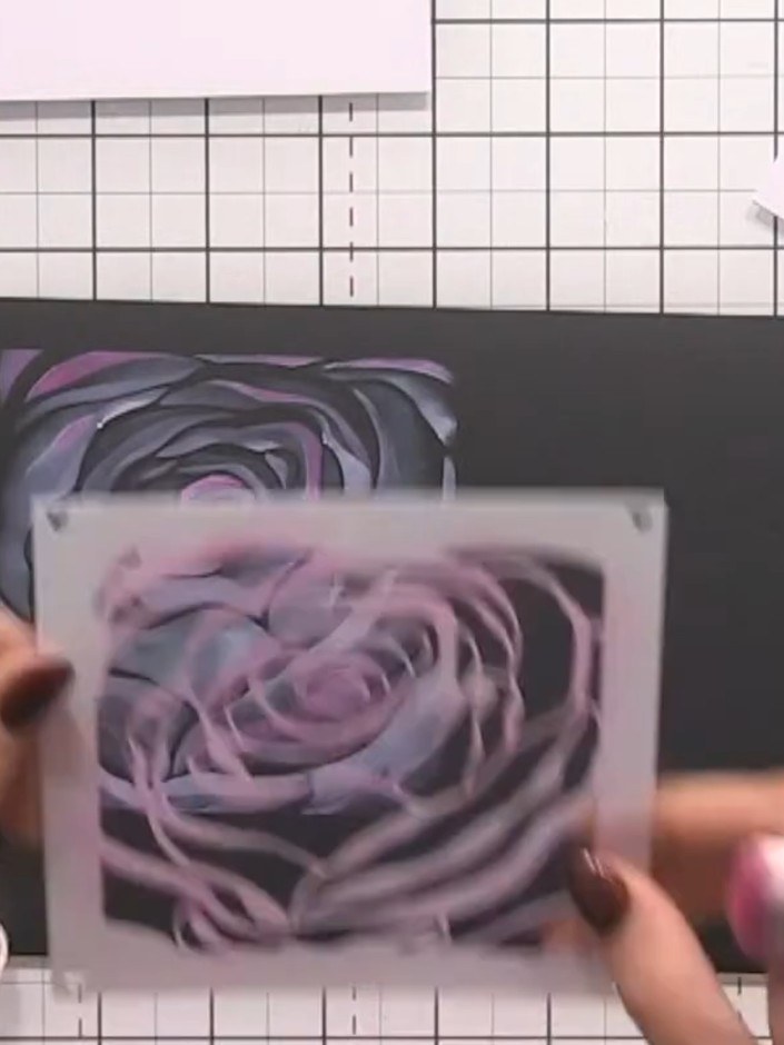 Step 9: Apply white ink through the rose stencil again over the coloured areas to add highlights and create additional