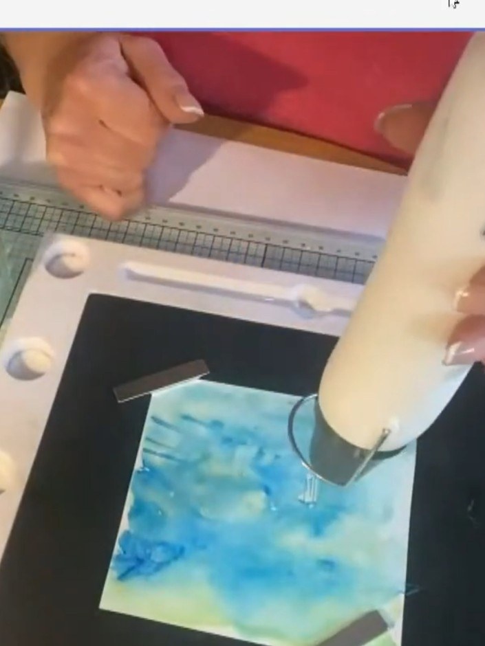 Step 6: Using a heat tool, dry the blended background thoroughly to set the inks. Hold the heat tool above the card an