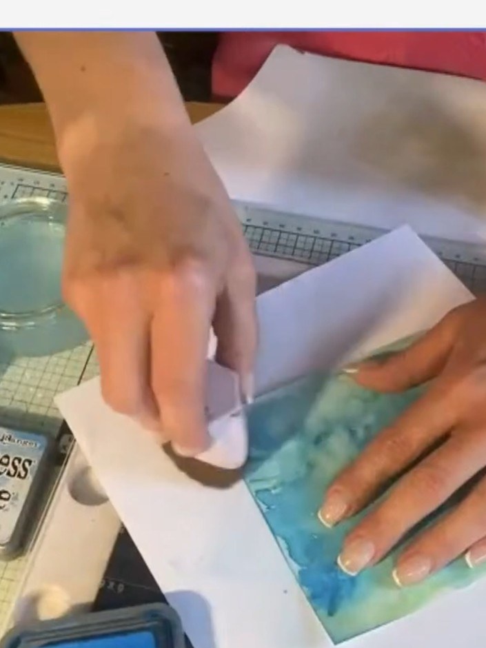 Step 7: Stamp the fish from the 'Under the Sea' stamp set onto clean white paper using your Eureka stamping tool. Posi