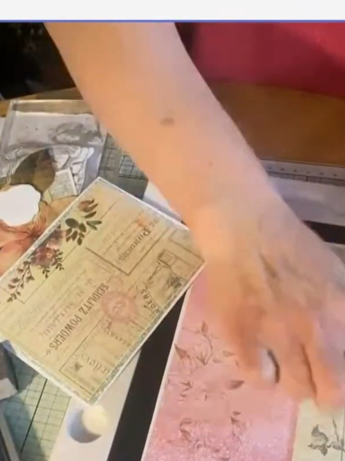 Step 4: Fussy cut beautiful floral elements from the decorative paper. Carefully cut around the flowers and botanical 