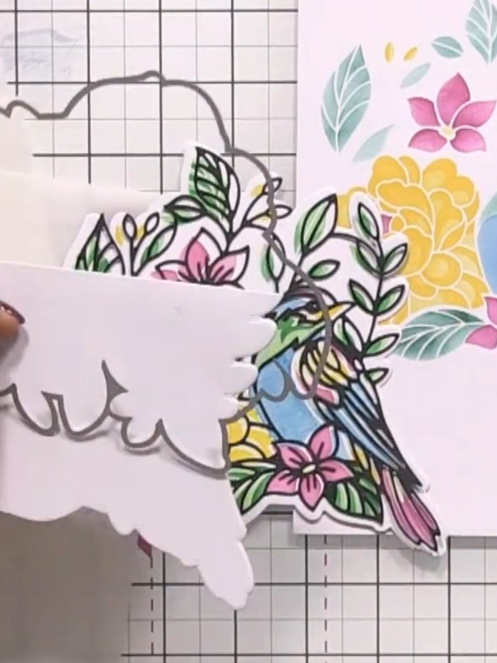 Step 7: Position the outline die on your card blank so it cuts only along the bottom edge, creating a hinged opening. 