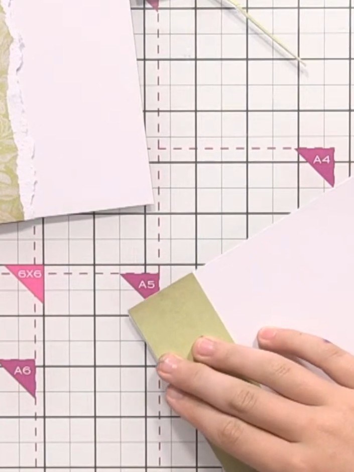 Step 1: Cut strips of varying widths from your vintage patterned papers. Use both the plain and patterned designs to c