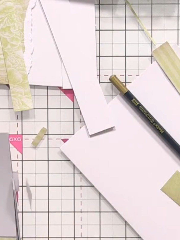 Step 5: Use a fine-liner pen to draw wood grain details and rivets across the layered green strips to create a faux wo