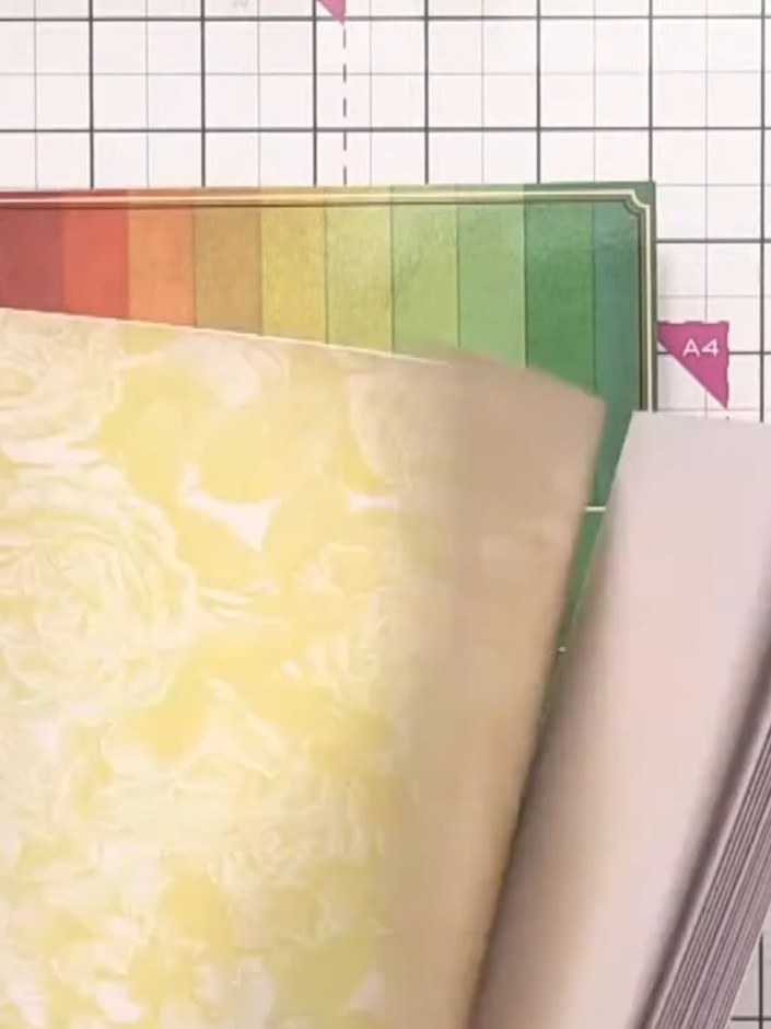 Step 2: Position your chosen stencil on the card base. Apply the darkest ink colour through the stencil, pressing firm