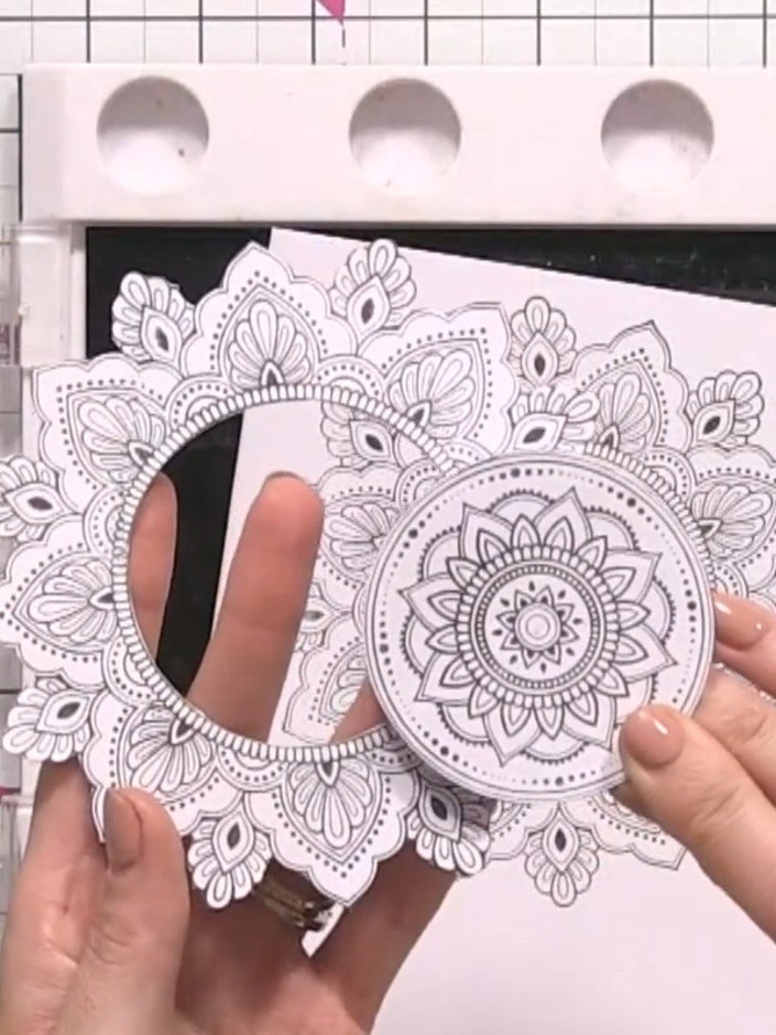 Step 3: Mat and layer each of the four stamped squares onto pieces of mirror board, creating a gold border around each