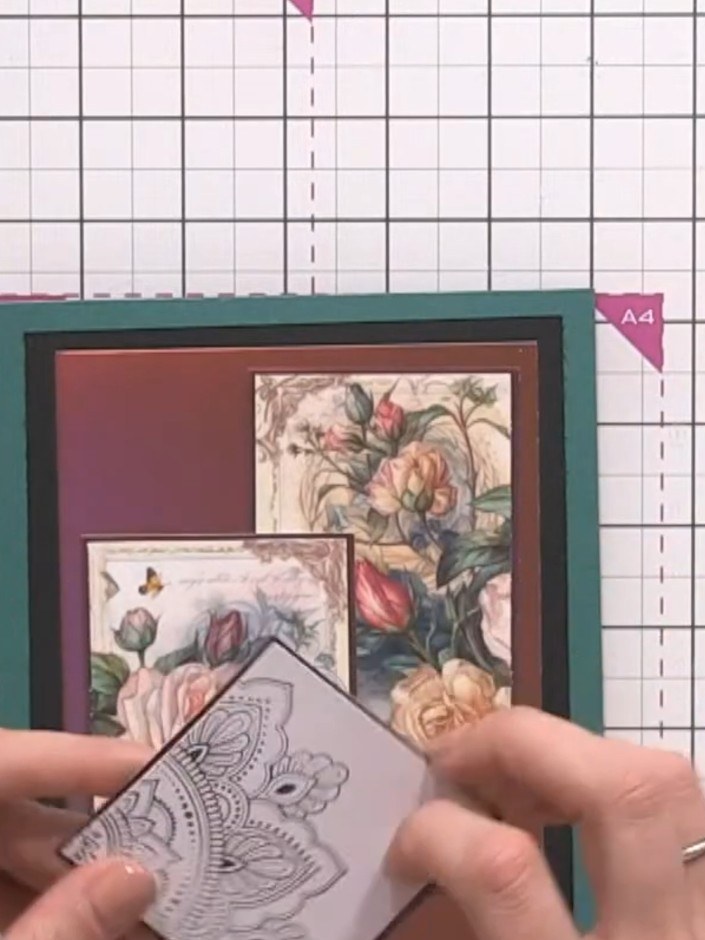 Step 5: Arrange the matted floral squares and decorative panels onto the layered teal and brown card base, positioning