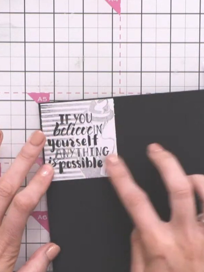 Step 10: Cut the sentiment backing into a rectangular mat and layer it onto the main card so the sentiment sits over th