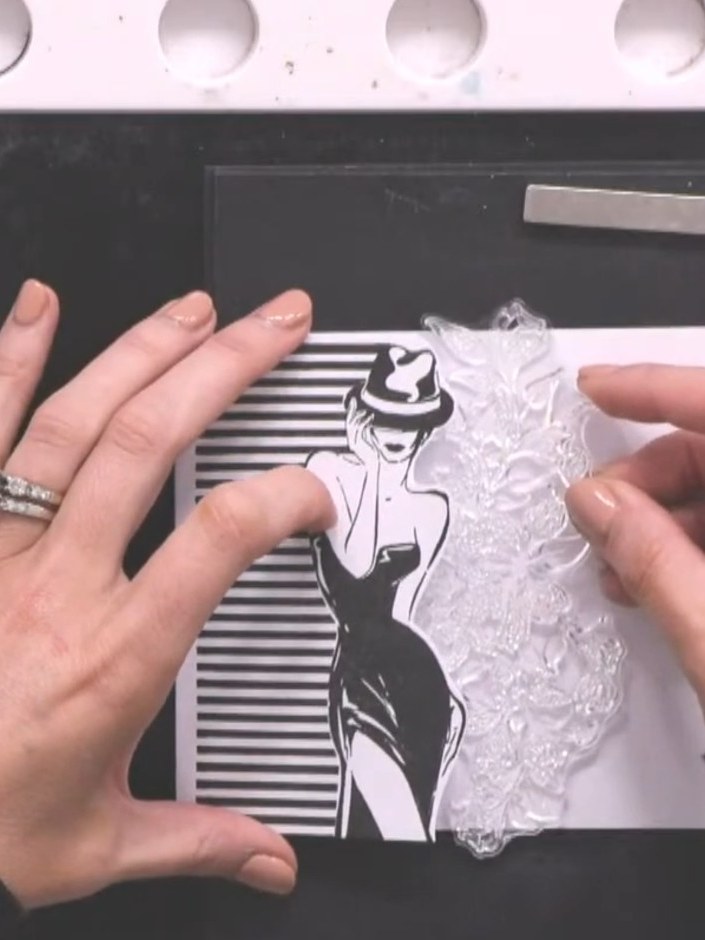 Step 3: Stamp the floral element onto the card using no-line watermark ink, positioning it to follow and complement th