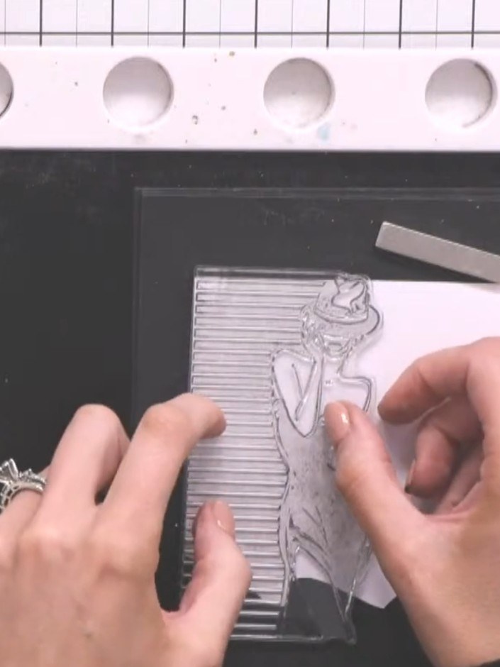 Step 8: Stamp the sentiment 'If you believe in yourself, anything is possible' in black ink onto white card. Position 