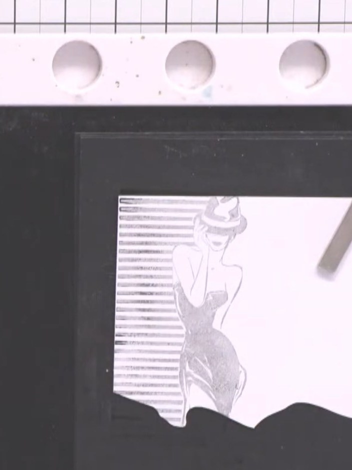 Step 9: Stamp the lady and stripes image again onto the white sentiment backing card using lighter ink to create a sec