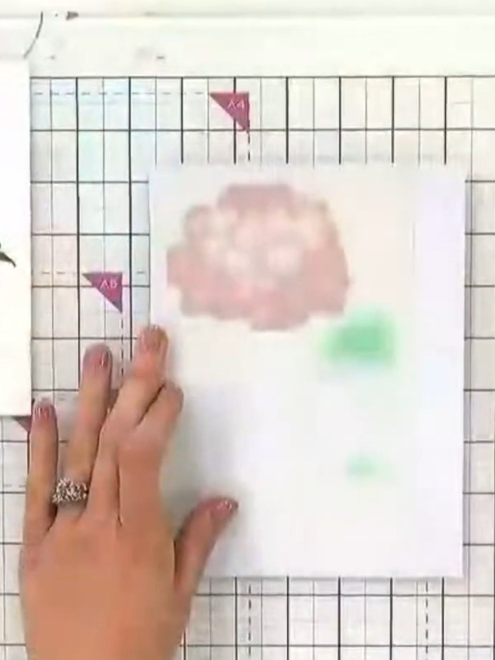 Step 6: Place the coordinating hydrangea die over the stamped image on your cutting mat. Run through your die-cutting 