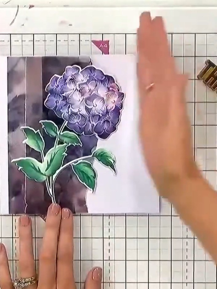 Step 5: Add a die-cut hydrangea element or sentiment to complete your card design. Position it on top of the layered v