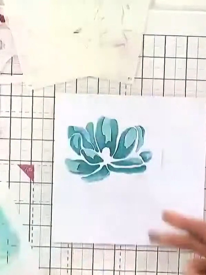 Step 4: Apply stencils three and four to build up the magnolia design, varying your pressure with the blending tool to