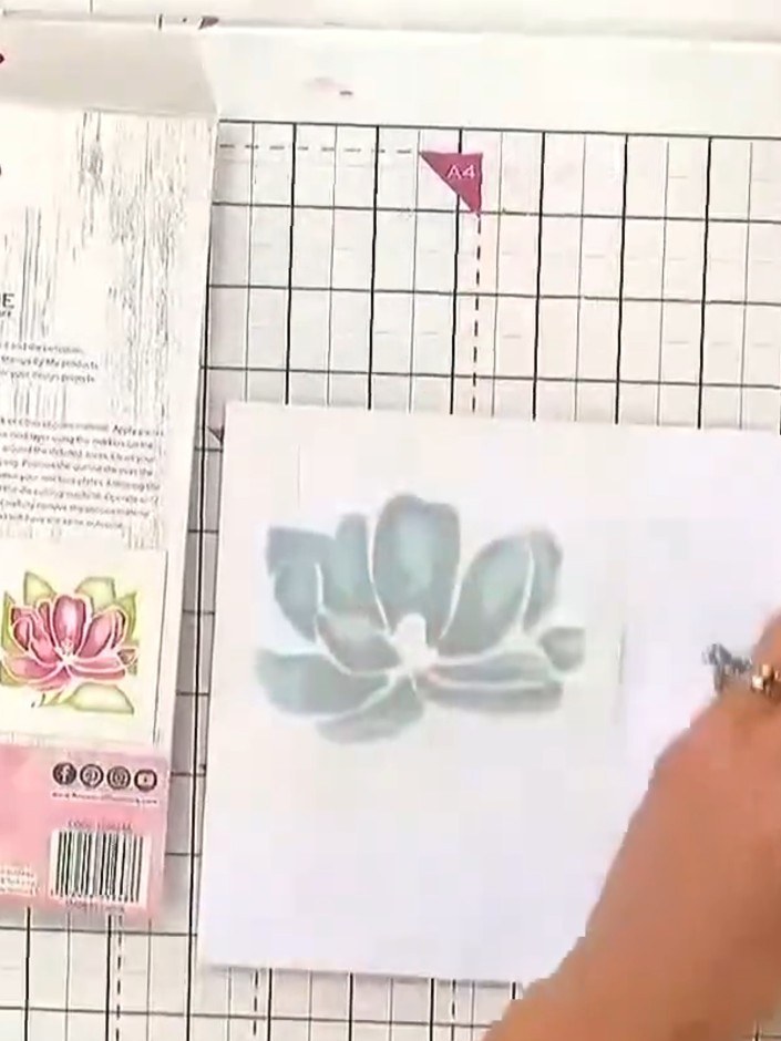 Step 6: Use the coordinating magnolia die to cut out the detailed flower shape from your stamped image. This will add 