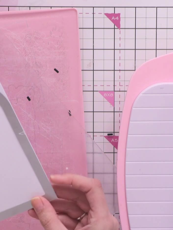 Step 2: Score a vertical line down the side of one of the back pieces using a scoring tool. This score line will help 