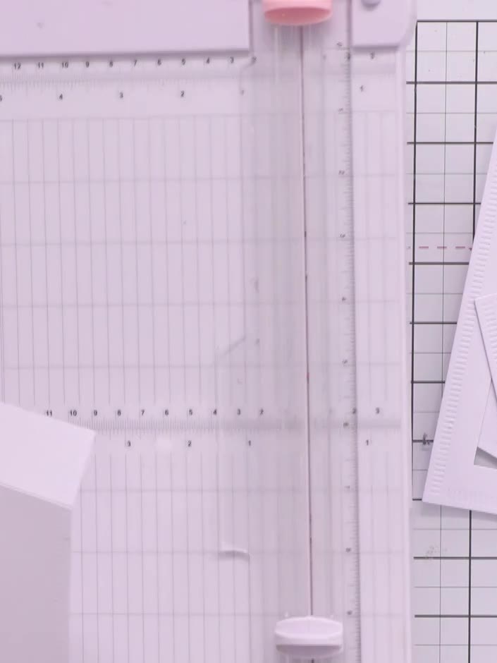 Step 3: Cut a second, smaller size of the Corner Curve die from white card stock. This will create a frame when layere