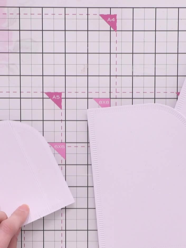 Step 3: Die cut a second, smaller size of the Corner Curve nested die from white card stock. This will create a frame 