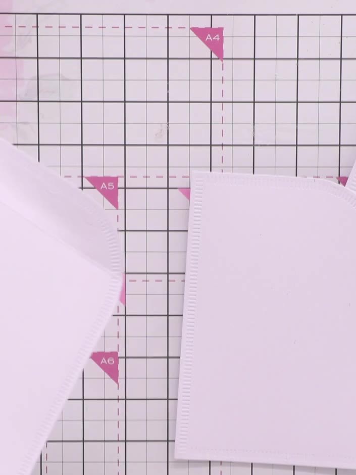 Step 7: Stick the patterned paper piece flat inside the frame opening. Position it carefully to ensure it sits flush w