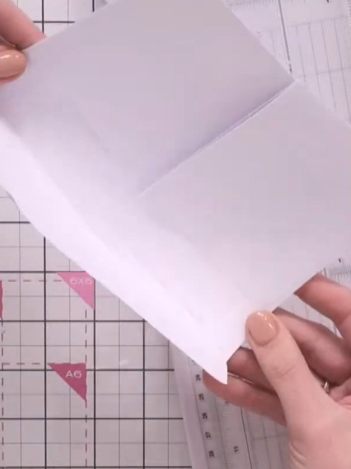 Step 4: Glue the cut flap onto the back of your base layer to create a pocket. Position the flap to form a two-page sy