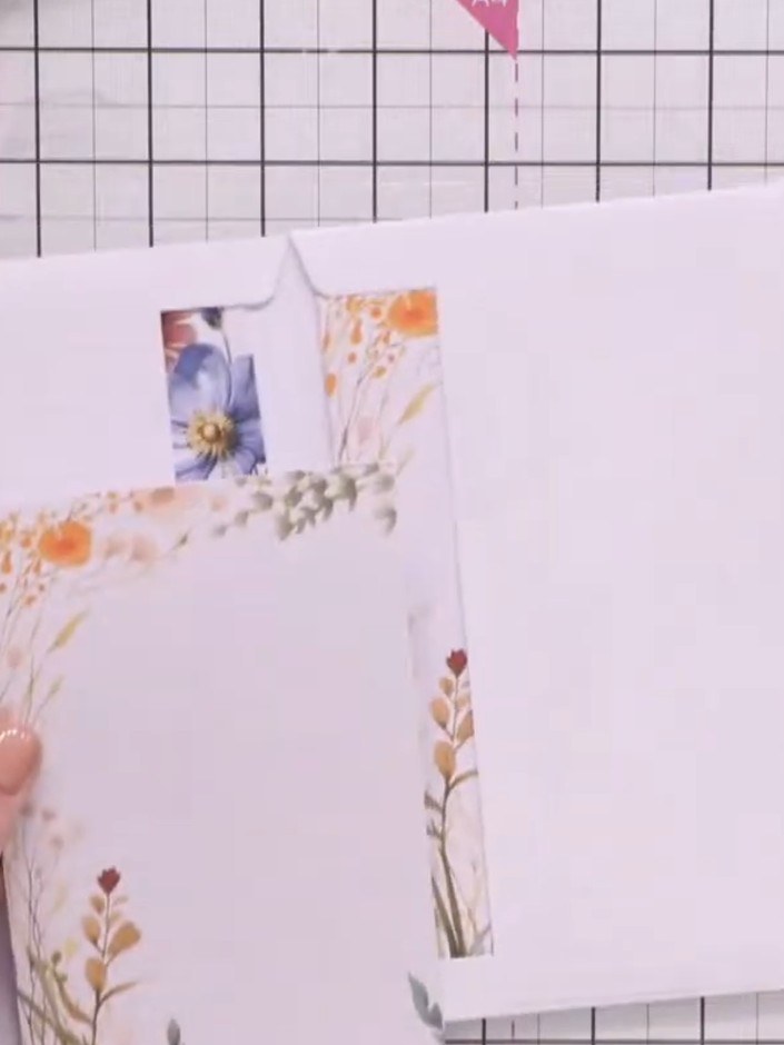 Step 8: Place decorative toppers or cut pieces inside the envelope pockets. Use glue to secure them in place so they d