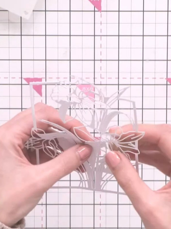 Step 2: Carefully pop out all the cut pieces from the die-cut sheet using a craft tool or your fingers. Take care with