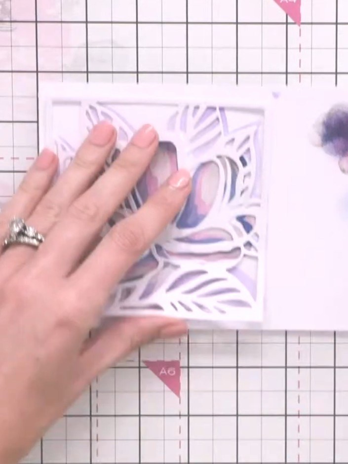 Step 8: Cut a second die-cut of the magnolia design from grey card stock to create a drop shadow effect. Use the chamf