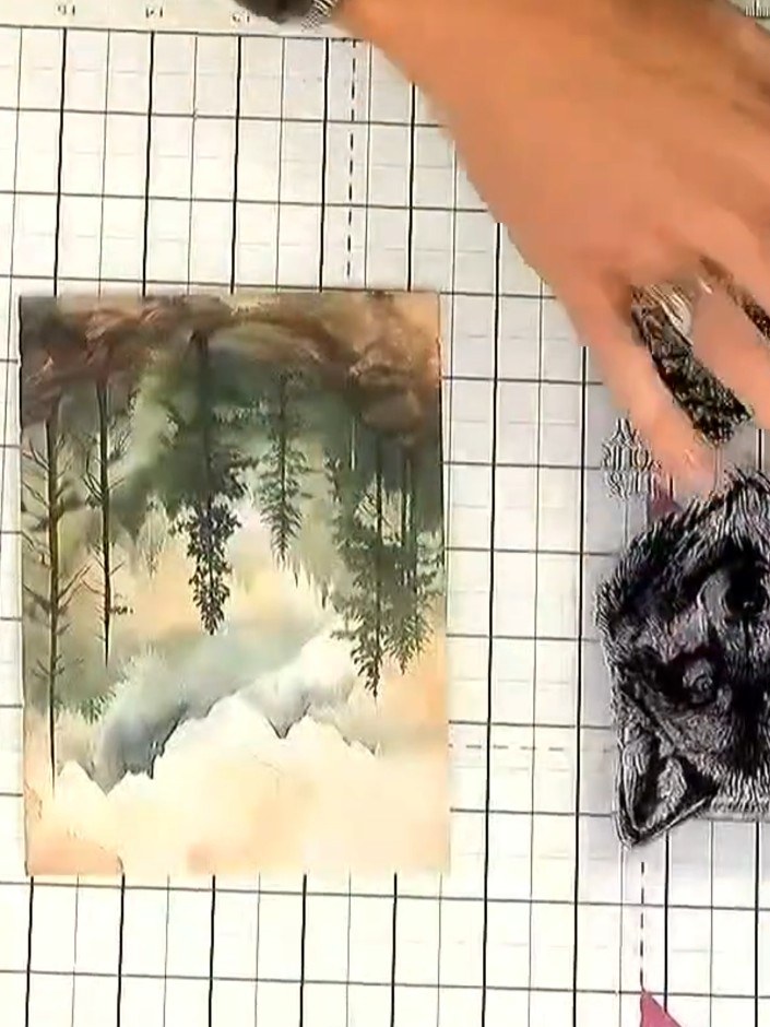 Step 1: Trim a piece of patterned paper from the Woodland Wildlife collection to your desired card size, selecting a d