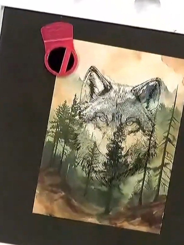 Step 3: Position the interior mask stencil over the stamped wolf image to protect the design whilst working on the bac